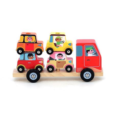 Colorful wooden car transporter toy carrying four small cars with illustrated drivers on a natural wood trailer.