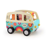 Wooden Vilac camper van toy with colorful rainbow and flower motifs, carrying animal figurines.