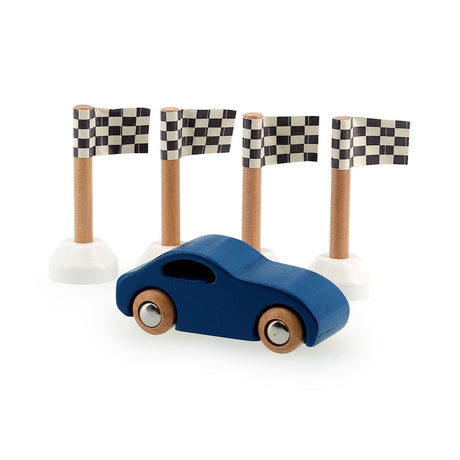 Blue wooden toy car racing past four checkered finish line flags on a white background.