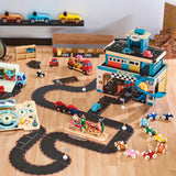 Vilac wooden toy car set with multi-story garage, flexible race track, and colorful miniature cars on a wooden floor.