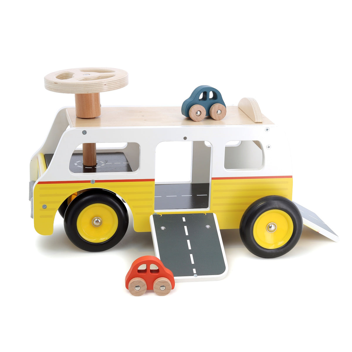 Wooden toy camper van in yellow and white with ramps, a steering wheel, and two small toy cars.