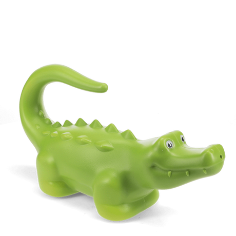 Green crocodile-shaped plastic watering can for kids, side view on a white background. Lightweight garden tool for children.