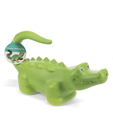 Green crocodile novelty watering can for gardening, featuring a curved tail handle and spiky back on a white background.