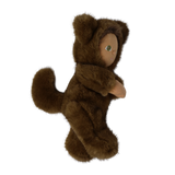 Side profile of a plush doll in a fuzzy brown werewolf suit showing its tail and ears.