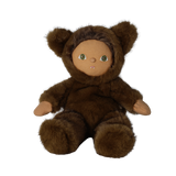 Seated plush doll in a fuzzy brown werewolf costume with hood and ears against a white background.