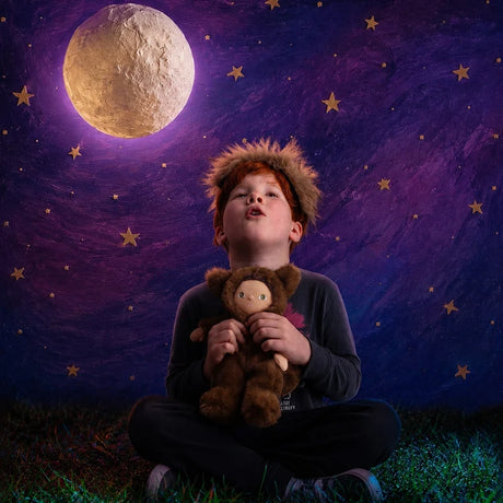 Child holding a werewolf plush doll, howling up at a full moon under a starry night sky.