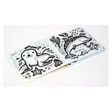 Black and white bath book illustration of a seal and dolphin with sea stars and coral. Simple, direct nautical art.
