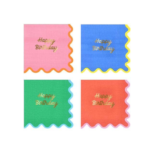 Four colorful Happy Birthday napkins in pink, blue, green, and red with scalloped edges and gold text.