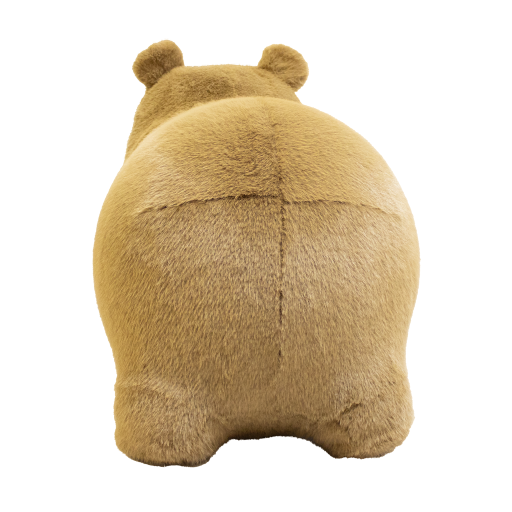 Cute, plush capybara toy against a white background. The toy has soft, golden-brown fur, a rounded snout, and tiny ears, giving a cozy and endearing appearance.