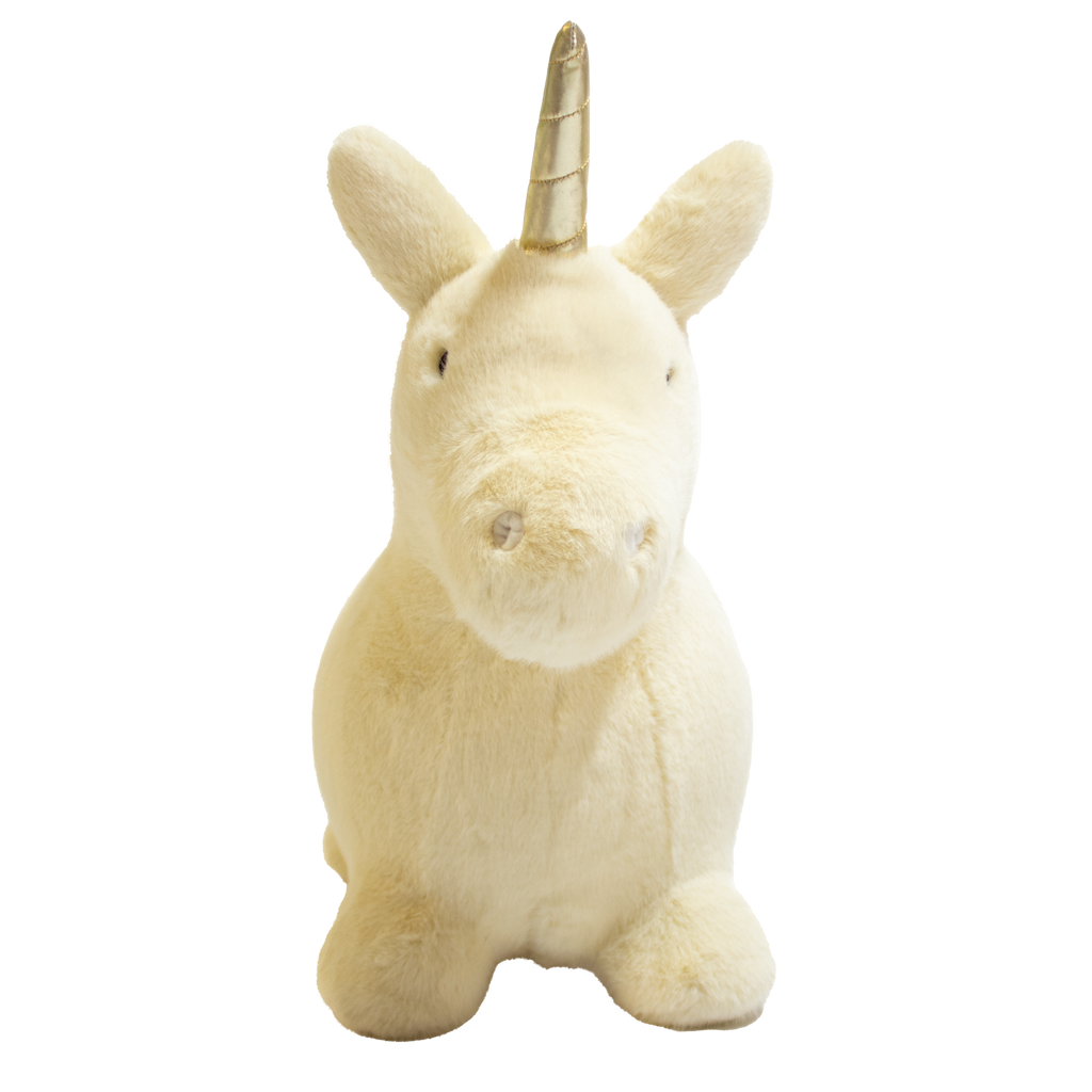 A plush unicorn toy with a golden horn and fluffy white mane and tail stands against a white background. The unicorn has a soft, cuddly appearance.