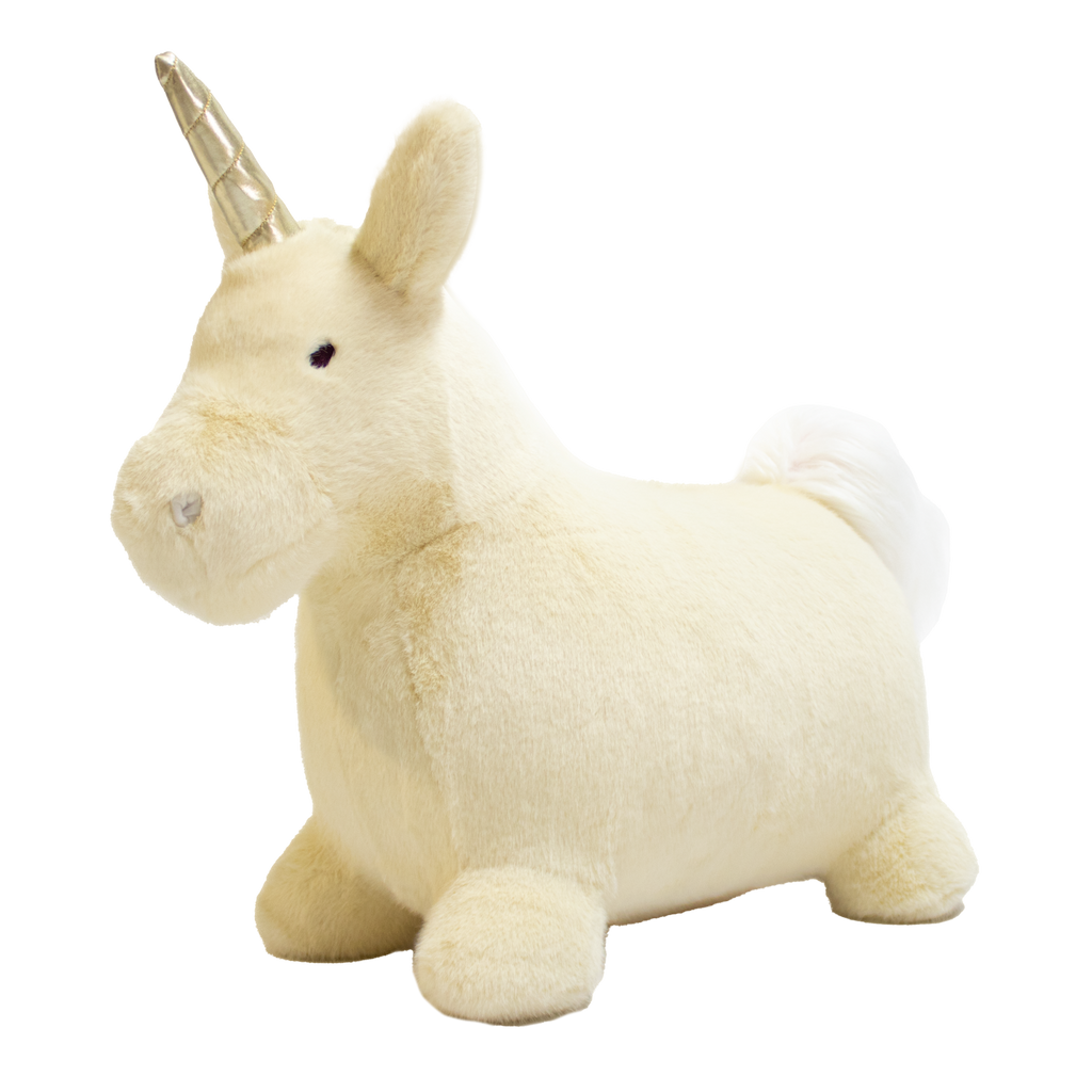 A plush unicorn toy with a golden horn and fluffy white mane and tail stands against a white background. The unicorn has a soft, cuddly appearance.