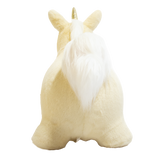 Rear view of a plush cream unicorn bouncy toy for kids with a fluffy white tail on a white background.