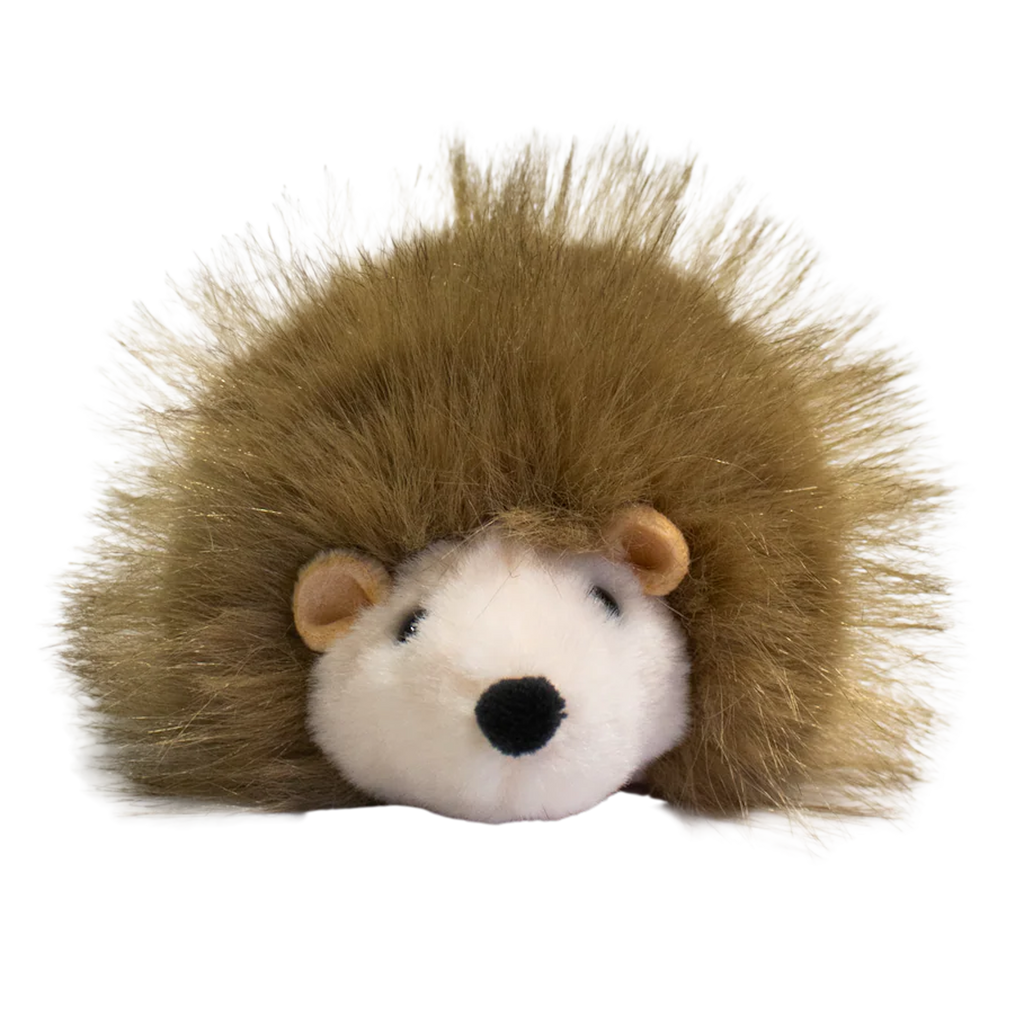 A plush hedgehog toy with a round, white face and soft, brown, spiky fur against a solid white background. The toy is cute and inviting.