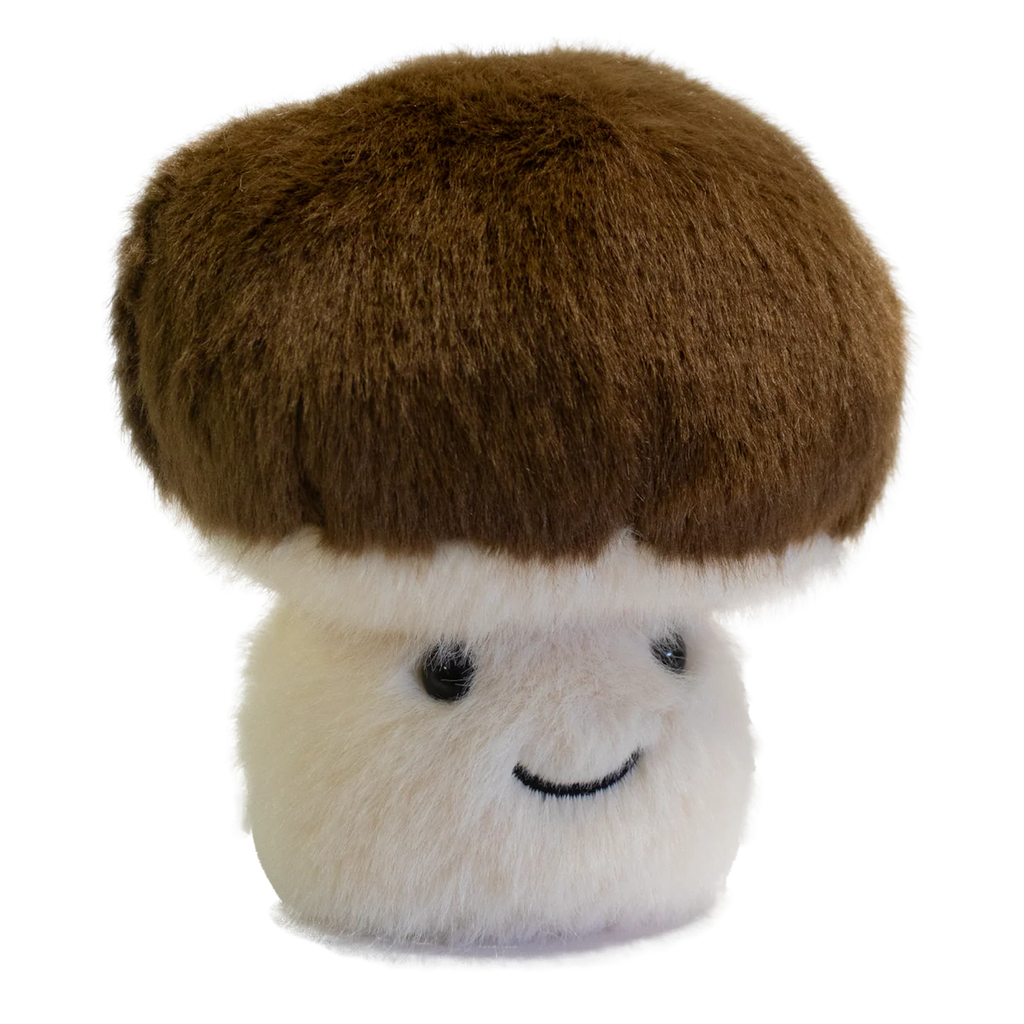 A plush toy shaped like a mushroom with a fluffy white stem and a round, brown cap. It has a smiling face, exuding a cute and cheerful vibe.