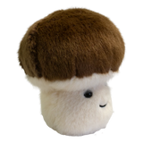 A plush toy shaped like a mushroom with a fluffy white stem and a round, brown cap. It has a smiling face, exuding a cute and cheerful vibe.