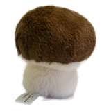 A plush toy shaped like a mushroom with a fluffy white stem and a round, brown cap. It has a smiling face, exuding a cute and cheerful vibe.