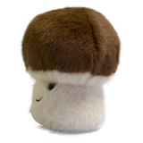 A plush toy shaped like a mushroom with a fluffy white stem and a round, brown cap. It has a smiling face, exuding a cute and cheerful vibe.