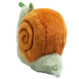A plush snail toy with a fluffy orange shell and a smiling green body, featuring green antennae, set against a plain white background.