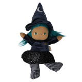 Plush witch doll with teal hair and pointed hat posing playfully with raised arms and a kicked leg.
