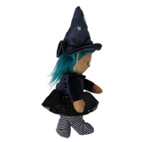 Side profile view of a plush witch doll with teal hair, pointed hat, and striped legs.