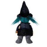 Back view of a plush witch doll with teal pigtails, a tall pointed hat, and a black sparkly skirt.