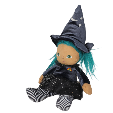 Seated plush witch doll with teal hair, pointed hat, and striped legs angled toward the left.