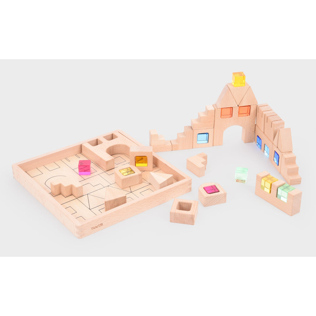 A set of wooden construction blocks with embedded colorful gems, designed to enhance imaginative play, light exploration, and fine motor skills.