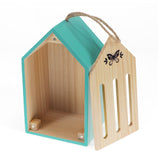 Teal wooden butterfly house with a natural wood front panel, hanging rope, and butterfly graphic on a white background.