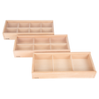 A set of natural wooden boxes with various openings and textures, designed to encourage sensory exploration and fine motor development in young children.