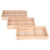 A set of natural wooden boxes with various openings and textures, designed to encourage sensory exploration and fine motor development in young children.