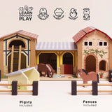 Wooden farmyard stable playset with icons for coordination, imagination, dexterity, and social skills.
