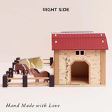 Right side view of the wooden farmyard stable toy set with horses, a fence, and a pigsty.