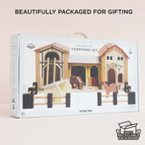 Le Toy Van wooden toy farmyard set packaged in a gift box with a carrying handle.