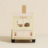 Rear view of Le Toy Van wooden ice cream toy showing back doors, taillights, and brand logo.