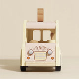 Front view of Le Toy Van wooden ice cream toy with headlights and grille.