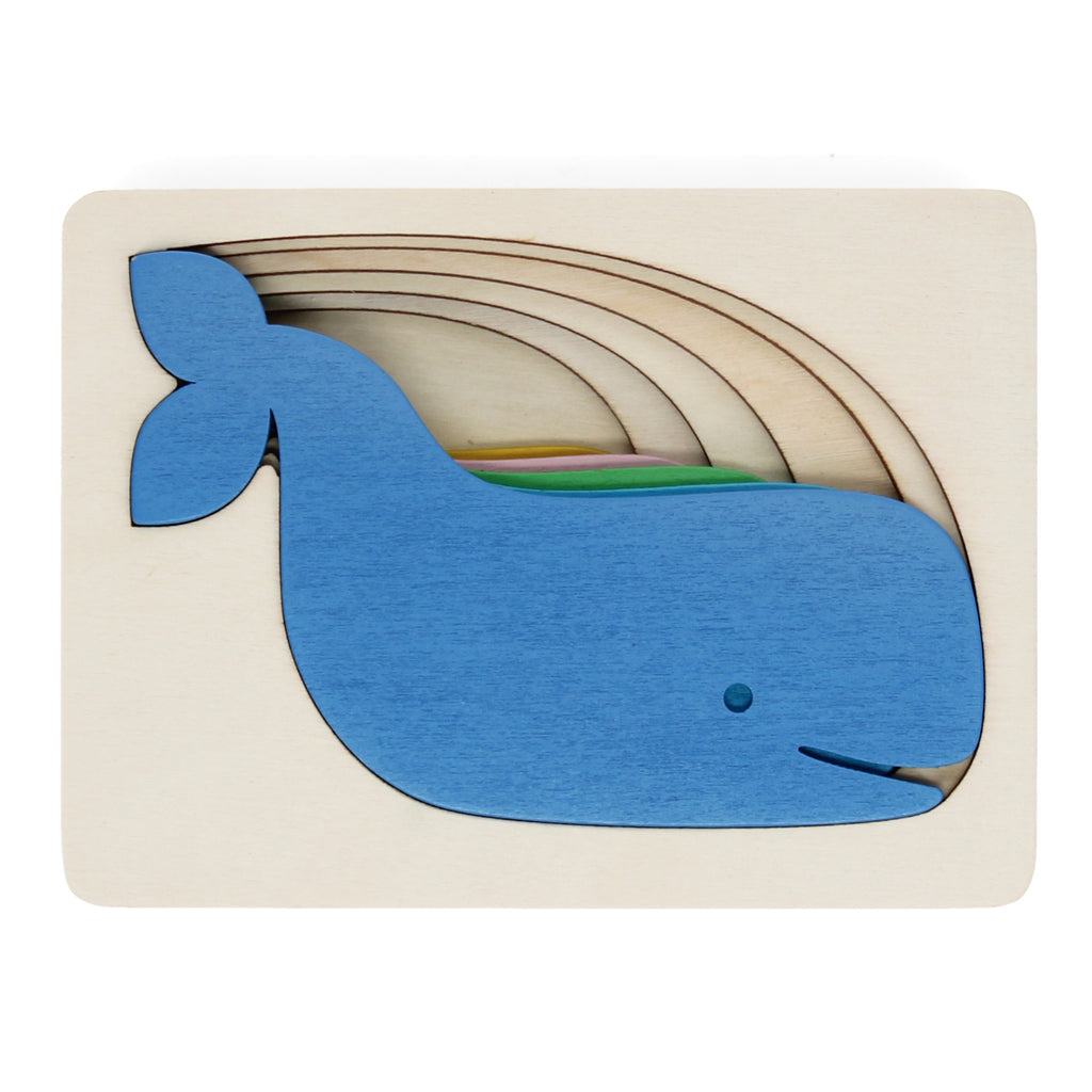 A colorful, multi-layered wooden puzzle featuring a whale design, designed for young children to assemble and enjoy.