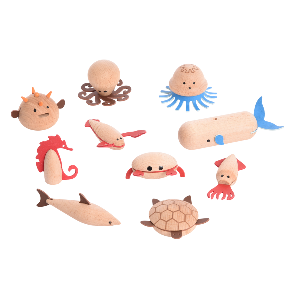 A set of brightly painted wooden marine animals, perfect for imaginative play, storytelling, and early learning activities.