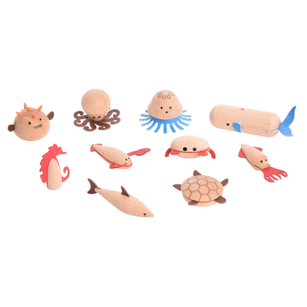 A set of brightly painted wooden marine animals, perfect for imaginative play, storytelling, and early learning activities.