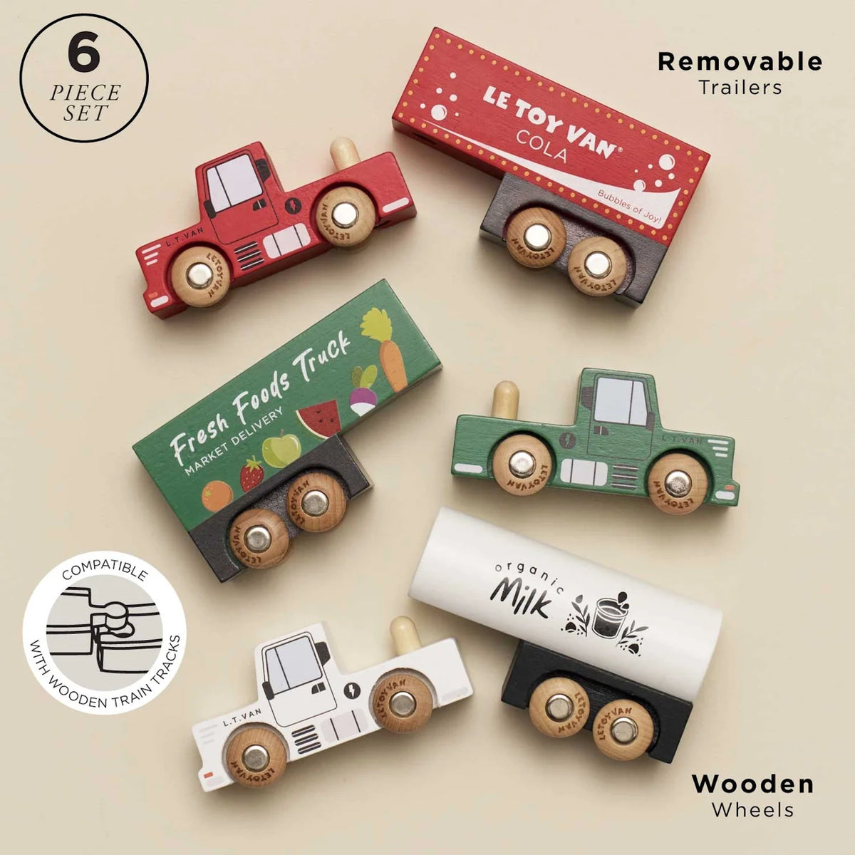 Six-piece wooden toy truck set with three cab trucks and three removable matching trailers.
