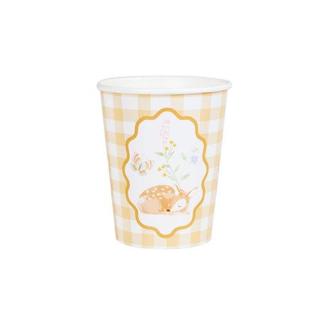 Yellow and white gingham paper cup featuring a central illustration of a sleeping deer fawn and wildflowers.