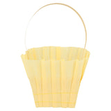 Yellow crepe paper Easter basket with a matching handle, perfect for spring party favors or treats.