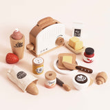 Wooden breakfast play food set featuring a toaster, bread, butter, coffee, jam, and yogurt.