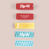 Five colorful Zip-it! party game cards stacked vertically showing prompts and logo designs.