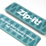 Teal Zip-it! party game cards, one reading "You must blow up your cheeks like a chipmunk"