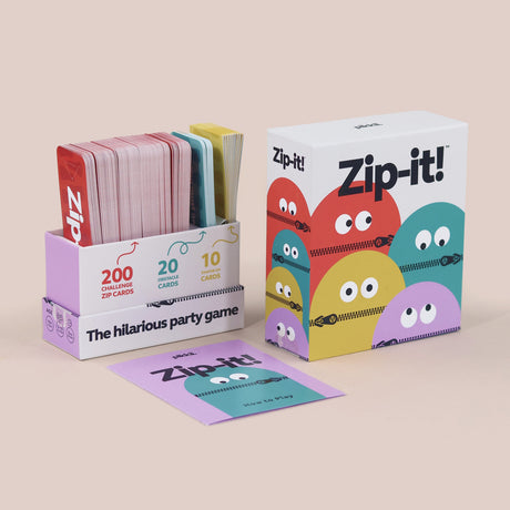 Zip-it! card game box set featuring colorful zipper monster graphics, card deck, and instruction card.